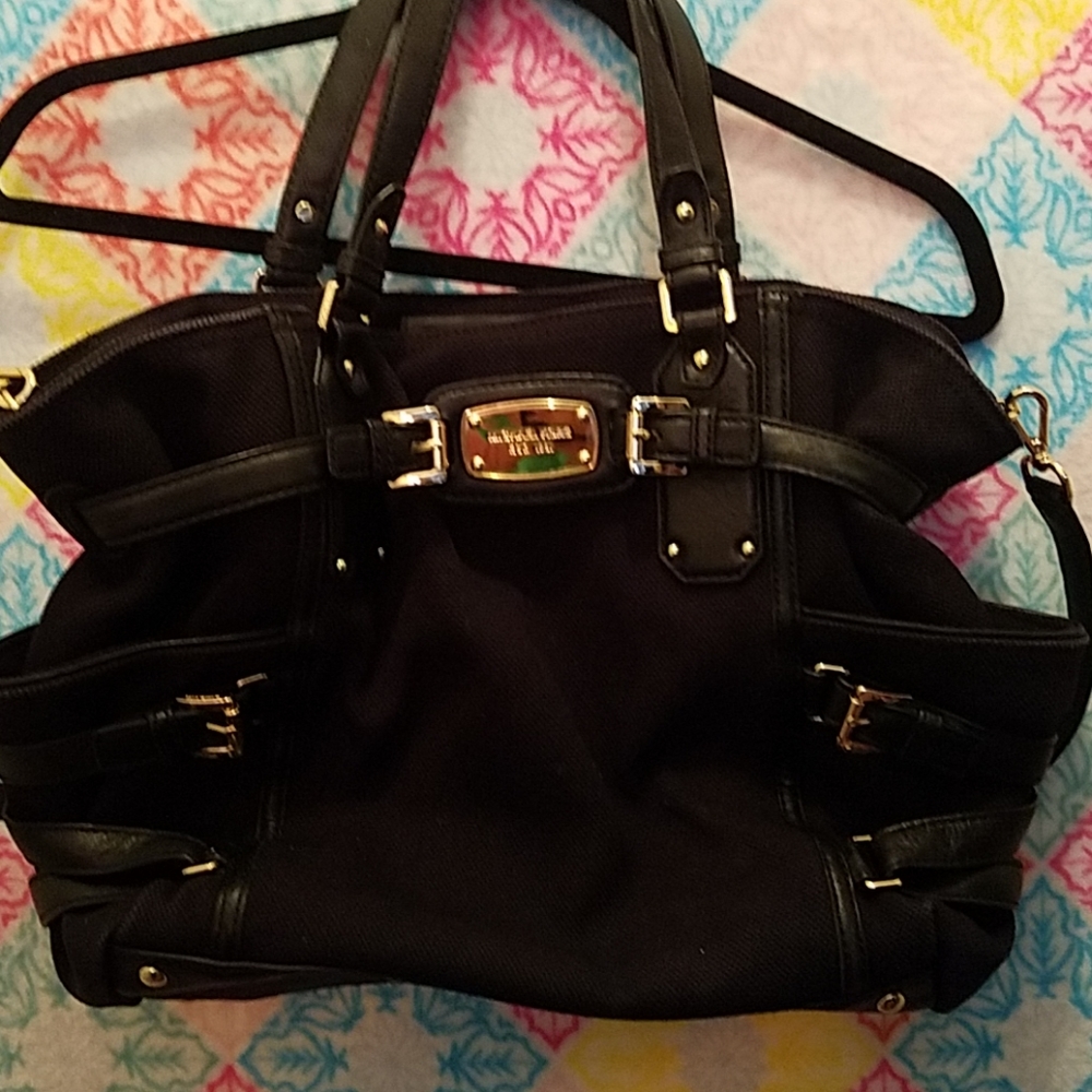 Used designer denim bag